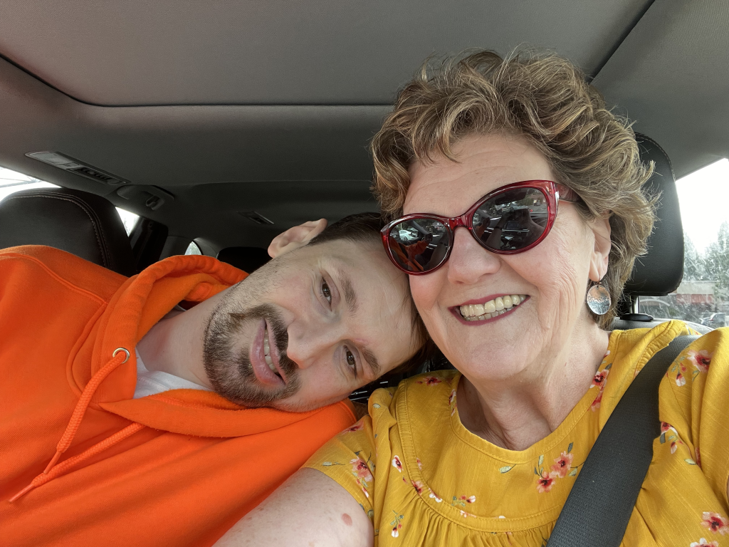 Michael and Mom Yellow blouse red glasses Sept 2024